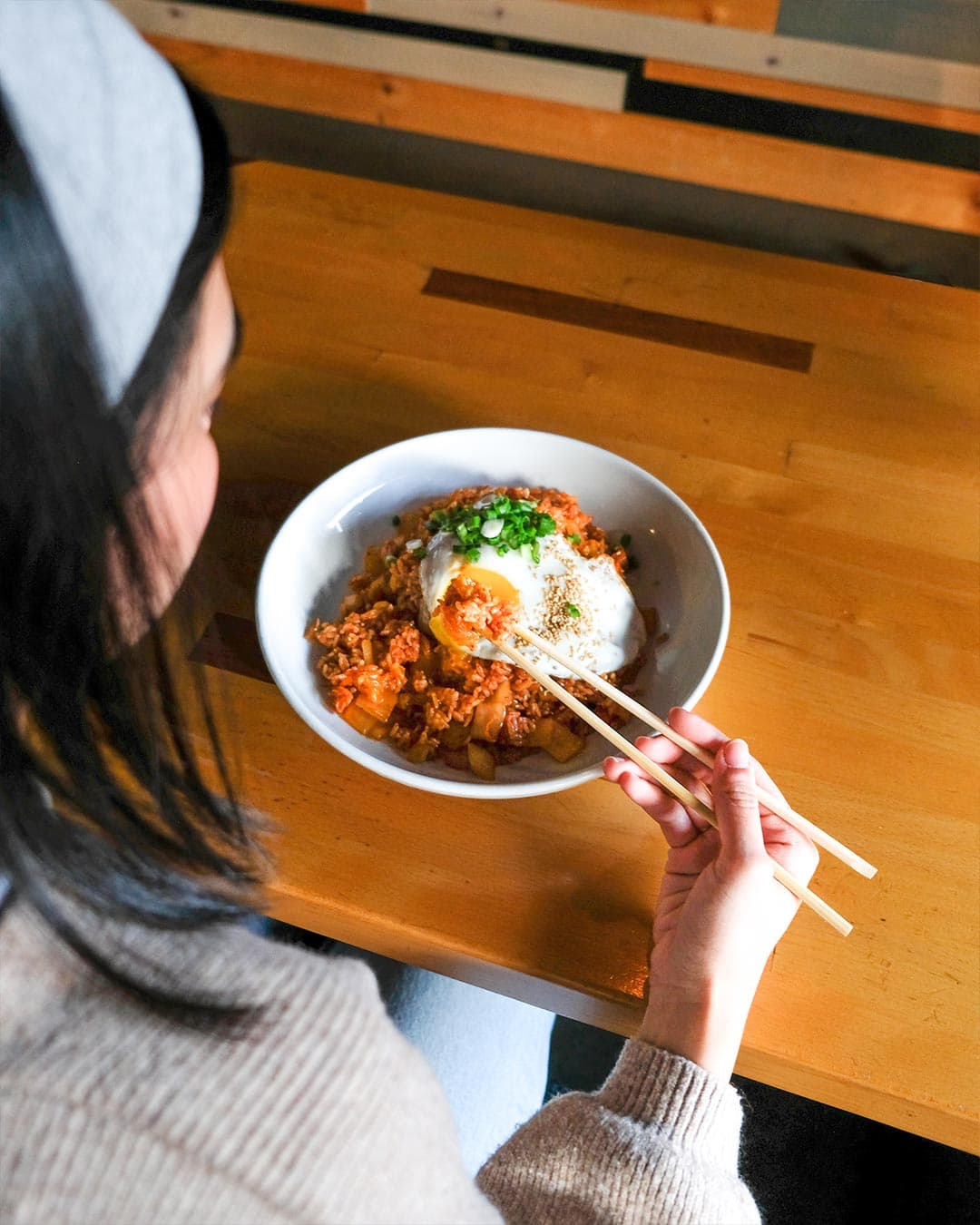 Signature Dolsot Kimchi Fried Rice with premium fresh seasonal ingredients prepared with care